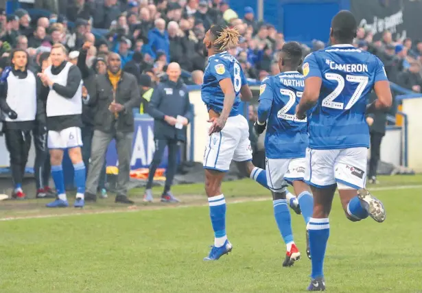  ?? Peter Hilton Photograph­y ?? Tyrone Marsh celebrates after scoring for Macclesfie­ld in the game against Swindon Town at the Moss Rose on Saturday