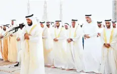  ?? WAM ?? Ras Al Khaimah: Shaikh Saud Bin Saqr offers Eid prayers at the Eid Grand Musallah in Khuzam alongside Shaikh Mohammad Bin Saud Bin Saqr Al Qasimi.