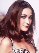  ??  ?? CUT-GLASS cheekbones. Aquamarine eyes. A delicately sloping nose. Nineties supermodel Carla Bruni (left) and model of the moment Bella Hadid, 22, could be blood relatives. Bella is the daughter of a Palestinia­n property developer while Carla’s