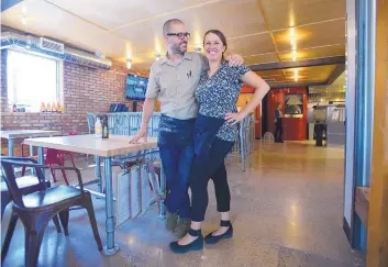  ?? ADOLPHE PIERRE-LOUIS/JOURNAL ?? Eclectic Urban Pizzeria and Tap House owner and chef Maxime Bouneou and his wife Daniela Bouneou at the restaurant the week it opened.