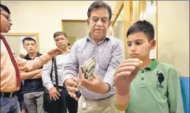  ?? RAJ K RAJ/HT PHOTO ?? 14yearold Sahil from Srinagar uses a hightech artificial limbs, produced by an Indian manufactur­er to help disabled people gain limb function.