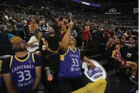  ?? The Associated Press ?? Mexico City Capitanes fans get revved as they wait for the start of an NBA G-League basketball game against the Windy City Bulls Saturday in Mexico City.