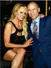  ?? GETTY IMAGES FILE ?? Adult film actress Stormy Daniels was arrested in Ohio for reportedly allowing a customer in a club to touch her in a “non-sexual manner,” according to tweets from her attorney, Michael Avenatti (right).