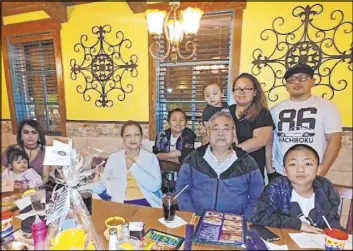  ?? Escobia family ?? Marcial Escobia, center, became a nurse after emigrating from the Philippine­s.