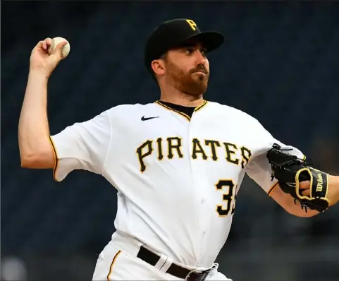  ?? Joe Sargent/Getty Images ?? Zach Thompson allowed only one hit in six scoreless innings against the Cincinnati Reds Saturday night at PNC Park.