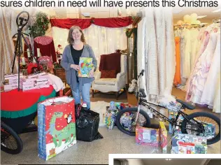  ?? Shelly Thorene
/ Union Democrat ?? Sierra Bridal owner Julia Jones (above) holds one of many toys still waiting to be picked up at the business in The Junction shopping center. Barbara Posada, 60, of Sonora (right, at right) picks up gifts for her 11-year-old daughter and namesake, Barbara, as The Junction manager Wendy Tippett-gast looks on. Trish Harris, 42, of Sonora (below), shows one of the many gifts she received for her twin 13-year-old boys at The Junction.