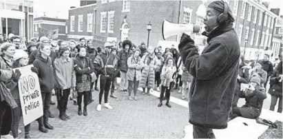  ?? KENNETH K. LAM/BALTIMORE SUN ?? Lester Spence, professor of political science, addressed about 100 Johns Hopkins University students and nonaffilia­ted residents who rallied on the Homewood campus last year with Students Against Private Police to oppose the university creating its own campus police force. The university has now said it will hold off on plans for such a force.