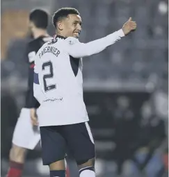  ??  ?? 0 James Tavernier celebrates after scoring to make it 4-0.