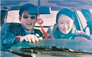  ??  ?? Driving the point home: Zhang Yi and Zhao Tao