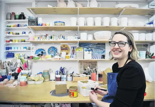  ?? PHOTOS: CHRISTINE O‘CONNOR ?? Topographi­c . . . Elise Johnston works on one of her ‘‘boxes’’ in her home studio. Below: A selection of Johnston’s work.