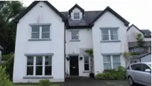  ?? BRYAN MEADE ?? Brian and Daniela Leahy with their three children, and, left, their home in Castleconn­ell, Co Limerick which they have been swapping every summer since 2011