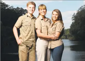  ??  ?? This image released by Animal Planet shows the Irwin family, from left, Robert, Terri and Bindi.