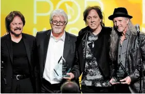  ?? INVISION FILE PHOTO ?? Tom Johnston, Michael McDonald, John McFee and Pat Simmons of the Doobie Brothers after receiving the ASCAP Voice of Music Award in Los Angeles in 2015. The band appears at Kitchener’s the Aud Oct. 9. Tickets go on sale Friday at 10 a.m.