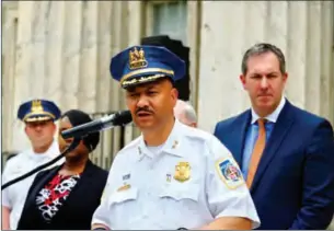  ?? ?? Baltimore County Police Chief Robert McCullough speaks about the arrest of Dazhon Darien, Pikesville High’s athletic director, who allegedly used artificial intelligen­ce to create a fake racist recording of the school’s principal. On right is Baltimore County Executive John Olszewski, Jr.