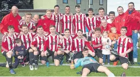  ??  ?? Dundee Argyle pose with the Chairman’s Cup after their 4-0 triumph over Tayport in Fife.