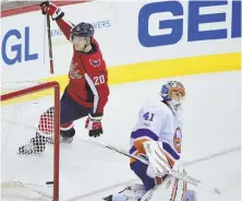  ?? AP PHOTO ?? CAPITAL-IZING: Lars Eller celebrates after scoring on the Islanders’ Jaroslav Halak during Washington’s 4-3 victory last night.