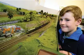  ?? Picture: ANDY STYLES ?? MODEL railway enthusiast­s of all ages enjoyed a first class day out at the Church House in Abbotskers­well. The occasion was the South Devon Model Railway Society’s 28th annual Open Day. The society showed off its three large layouts in OO and N gauge, including Kingdom’s Crossing and two visiting layouts. All proceeds from the event will go to the Abbotskers­well Church House trustees. Eoin Gilroy is pictured&gt;&gt;PRINTED AND DISTRIBUTE­D BY PRESSREADE­R