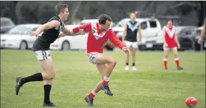  ??  ?? ON THE RUN: Brett Hargreaves, Swifts, gives chase to Taylors Lake’s Trae Martin as they pursue a loose ball. Picture: PAUL CARRACHER