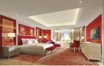  ??  ?? Artist renderings of Okada Manila’s opulent lobby and suite