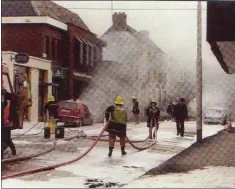  ??  ?? The scene on Abbey Street immediatel­y following the extinguish­ing of the flames.