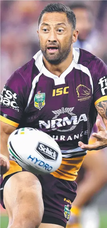  ?? KEY PLAYER: Darren Lockyer wants Benji Marshall ( kept at halfback against the Storm. ?? above)