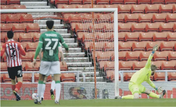  ??  ?? Lee Johnson expects an open game against Lincoln City tonight. Pictured, action from the game at the Stadium of Light that ended 1-1.