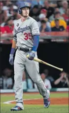  ?? Gregory Shamus Getty Images ?? CODY BELLINGER didn’t fare any better than the Dodgers’ pitchers, striking out in both of his All-Star game at-bats.