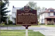  ?? ALIAH KIMBRO — THE MORNING JOURNAL ?? Marker to honor Lorain native Toni Morrison was installed in front of Carnegie Center.