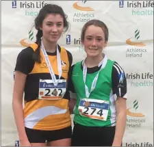  ??  ?? Ashford AC’s Ellen Savage and Parnell AC’s Laci Jane Shannon after the Irish Life Health National Juvenile ‘B’ championsh­ips in Dundalk.