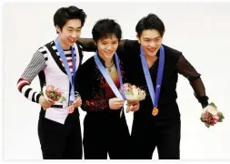  ??  ?? From left, silver medalist Jin Boyang of China, gold medalist Shoma Uno and bronze medalist Yan Han of China pose in medal ceremony Sunday for the men's free skating in the Asian Winter Games at Makomanai Indoor Skating Rink in Sapporo, Japan. (Reuters)