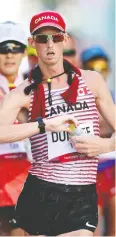  ?? LINTAO ZHANG / GETTY IMAGES ?? Evan Dunfee of Richmond,
B.C., won bronze in the men’s 50-km race walk.