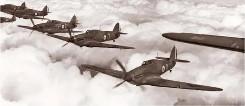  ??  ?? Six Hurricane Mk. Is of No. 73 squadron based at Reims, France, fly close formation on April 19, 1940. The RAF photograph­er took the photo from the backseat of a Fairey Battle.