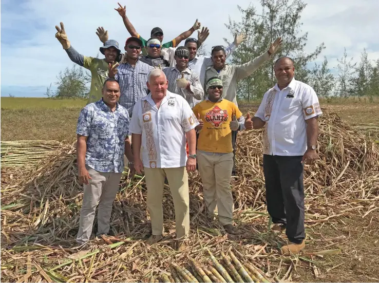  ?? Photo: Yogesh Chandra ?? Fiji Sugar Corporatio­n chief executive officer Graham Clark (front-second-left), FSC chief operating officer Navin Chandra (front-right) with FSC staff members and landowners in Nasarawaqa, Bua on December 14, 2018.