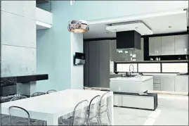  ??  ?? SUITABLY SLEEK: The kitchen is the heart of the home and can be designed to suit your needs