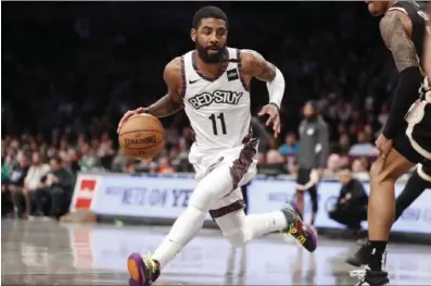  ?? Amny.com photo ?? Brooklyn Nets guard Kyrie Irving drives with the ball.