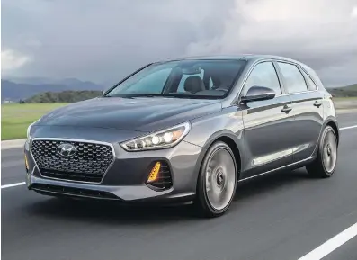  ??  ?? Following a redesign for the 2018 model, the new Elantra’s lines are clean and straightfo­rward.