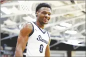  ?? GREGORY PAYAN/AP ?? SIERRA CANYON’S BRONNY JAMES smiles during a high school basketball game against Christophe­r Columbus at the Hoophall Classic on Jan. 16 in Springfiel­d, Mass.