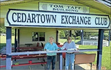  ?? Contribute­d by Jane hamlett ?? Cedartown Exchange Club members Walt Rupert and Freddy Arencibia work on cleaning up some of the buildings at the Polk County Fairground­s during a workday last week. The traditiona­l Polk County Fair returns Sept. 8-12 after being postponed last year because of safety concerns related to COVID-19.