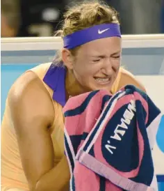  ?? GREG WOOD / AFP / GETTY IMAGES ?? “It wasn’t a happy face, but I was happy inside,” Victoria Azarenka said..