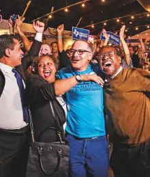  ?? AP ?? Supporters of Lizzie Pannill Fletcher celebrate as results are announced in her race against incumbent John Culberson for the 7th Congressio­nal District seat in the House of Representa­tives on Tuesday in Houston.