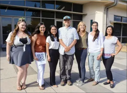  ?? ?? The University of Hawaii Maui College research team of (from left) Luz Maria Deardorff, Francesca Yadao, Rachael Kent, Peter Fisher, Sally Irwin, Michelle Gould and Junnie June pose for photo following the publicatio­n of their recent peerreview­ed paper.