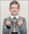  ??  ?? Seamus Stevenson, age 9-10 solo Gaelic song; Ronnie MacIntosh, 1st in bagpipe solos novice; Graham Laidlaw, 2nd in bagpipe solos novice.