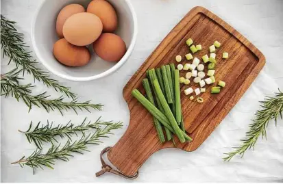  ?? Ellen M. Banner / Tribune News Service ?? Some of the ingredient­s that go into a breakfast strata., which makes great use of leftover bread and other items that might go to waste.