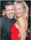  ??  ?? ROCKING THE RED Anne Marie Trudeau and husband Patric Chavarie steam up the dance floor at the annual Lise Watier Foundation Gala Benefit.