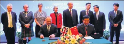  ??  ?? THE UK’s Minister of State for Trade and Export Promotion and Her Majesty’s Ambassador to China have witnessed the signing of an agreement with Loughborou­gh College which sets a path to a new global partnershi­p.