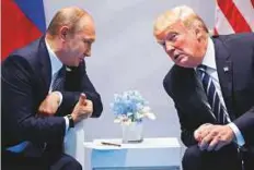  ?? AP ?? ■ President Donald Trump with Russian President Vladimir Putin at the G-20 Summit in Germany in July. The Kremlin said Trump called Putin to congratula­te him on re-election.