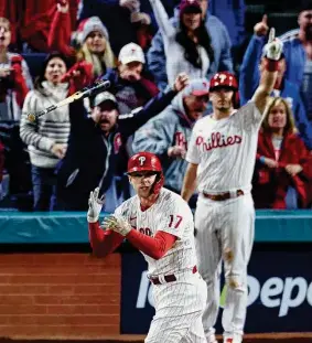  ?? Tim Nwachukwu/Getty Images ?? Rhys Hoskins watches his two-run home run off San Diego’s Sean Manaea during the fifth inning Saturday at Philadelph­ia. Hoskins had two homers.