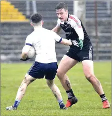  ??  ?? Oisín Grehan of St Attracta’s defends a Rice College move.