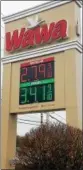  ?? DONNA ROVINS — DIGITAL FIRST MEDIA ?? Thursday’s gasoline price per gallon is on display at the Wawa on West Schuylkill Road in North Coventry. AAA is forecastin­g gas prices topping $3.00 per gallon in time for the summer driving season.