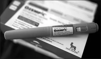  ?? DAVID J. PHILLIP / ASSOCIATED PRESS FILE (2023) ?? The injectable drug Ozempic largely mimics the effect of a hormone that acts on many parts of the body.